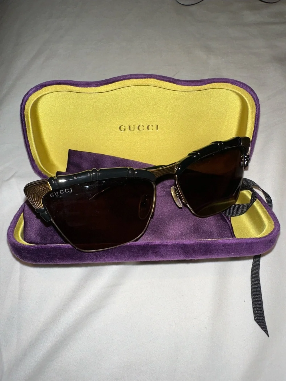 Limited edition Gucci Black Sunglasses with Gold Accents in Yellow & Purple Case